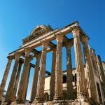 brown concrete building under blue sky