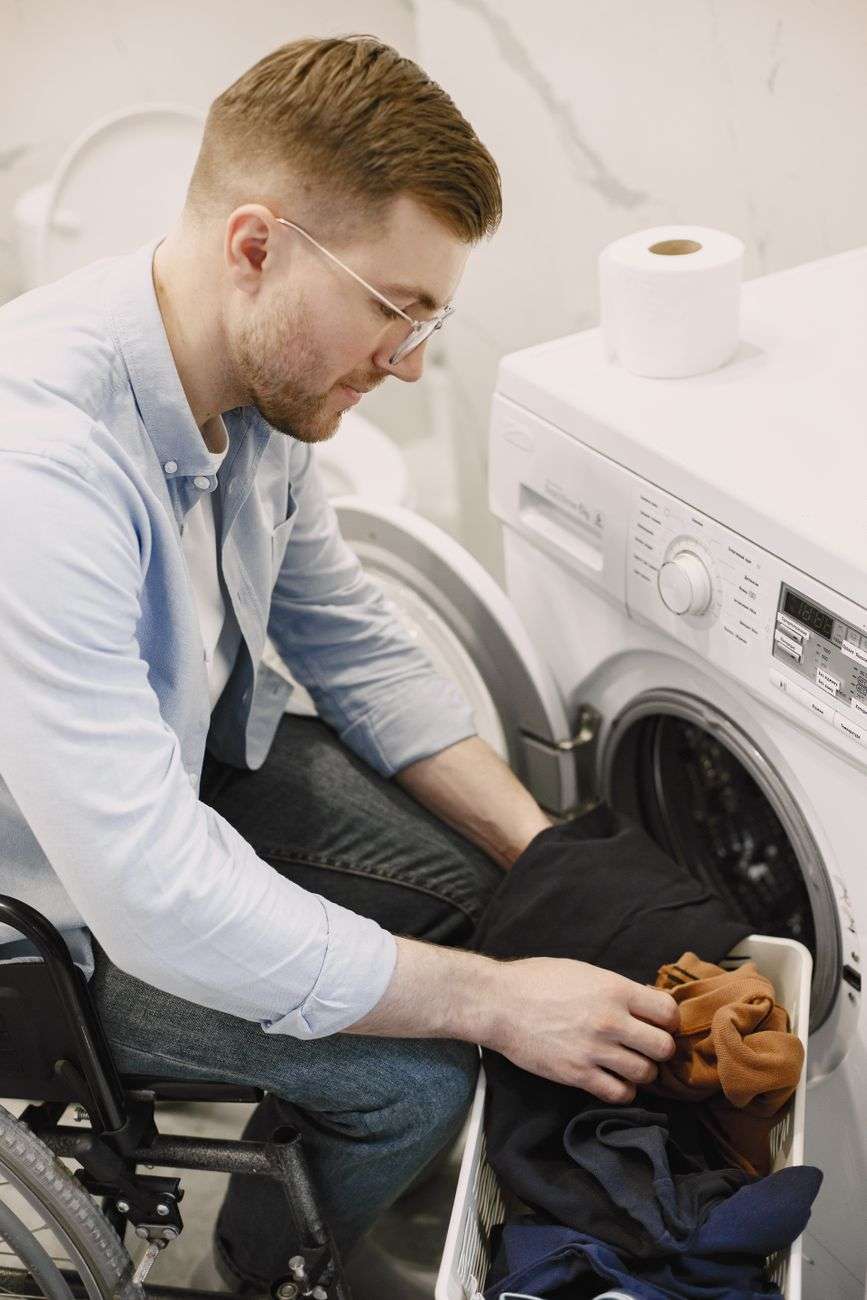 man doing his laundry
