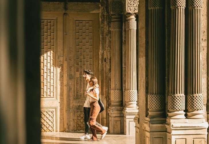 couple walking in passage in istanbul